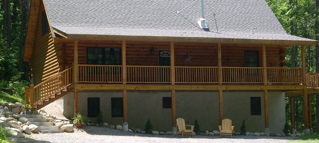 Charming log home, spacious yet cozy, nestled in the White Mountain region.