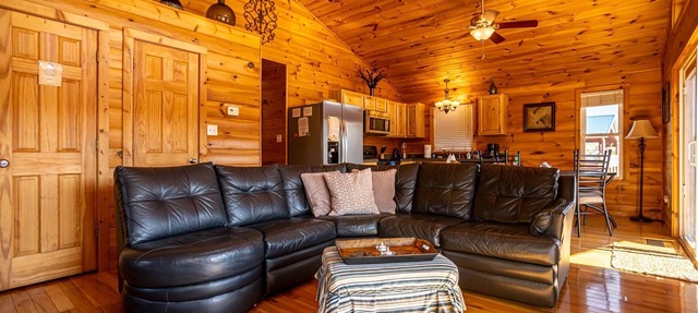Charming riverside with stunning views, cozy interiors, full amenities, and spacious decks.