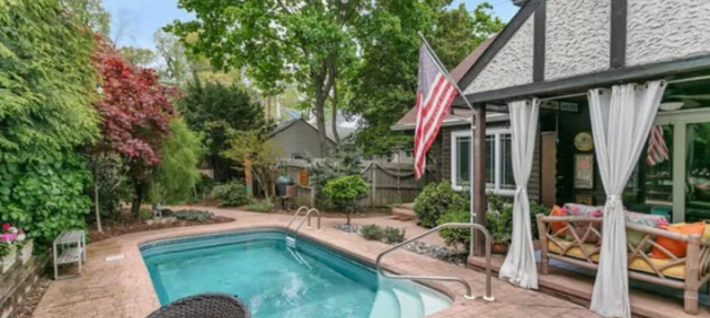 Charming Tudor-Style Home with Ultimate Privacy in the Highlands