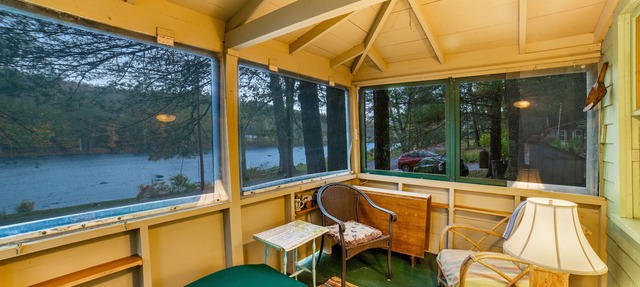Classic riverfront cottage w/beautiful water views, WiFi, & screened porches