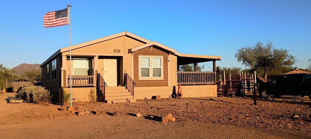 Comfortable two-bedroom house only 30 minutes from downtown with horse stalls.
