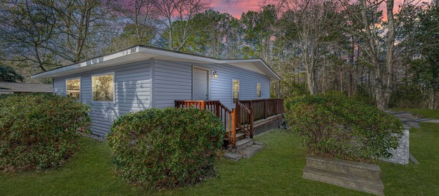 Completely renovated lake house with boat landing, dock, fire pit and deck!