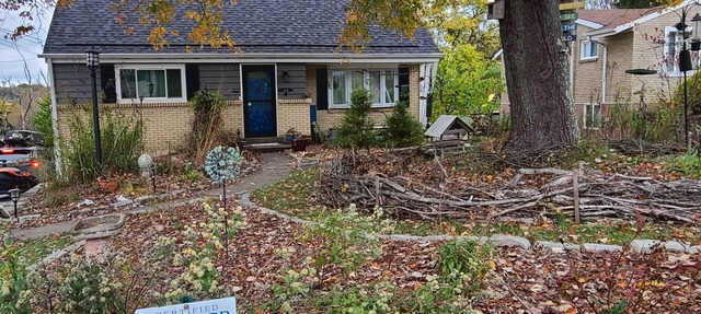 Cozy 2 bed/2.5 bath home with beautiful yard in peaceful neighborhood.