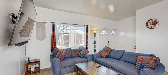 Cozy home with nice backyard, southwestern decor, & central location