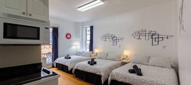 Cozy STUDIO 3 Full beds in Midtown 1