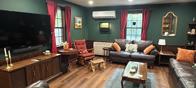 Cozy woodland retreat with modern comforts and rustic charm.
