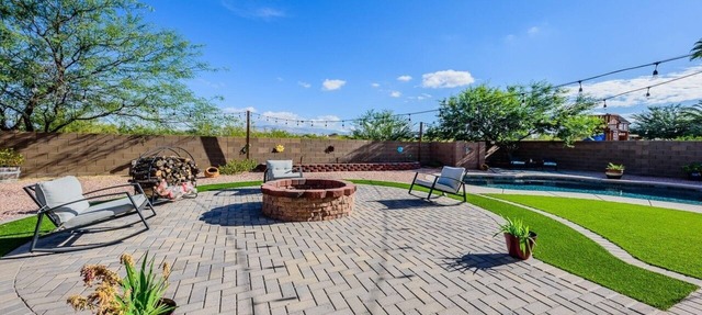 Desert home with pool, fire pit & mountain views