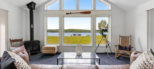 Dog-friendly lake escape with sunroom, high-speed WiFi, water views & central AC