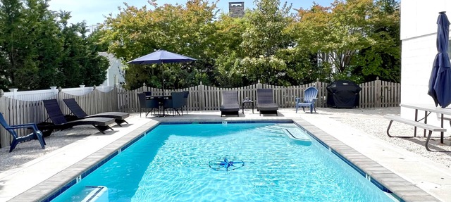 Easy Walk to Beach & Town. Private, heated pool!