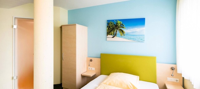 Einzelzimmer mit Flatscreen und WLAN