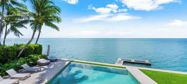 Exceptional 6-bedroom ocean villa in Key Biscayne featuring infinity pool & more