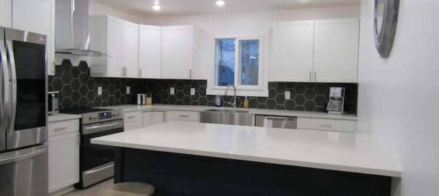 Exceptional Home with Htd Garage in Town