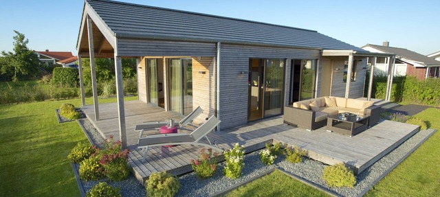 Exclusive design holiday home made of healthy natural materials with top equipment