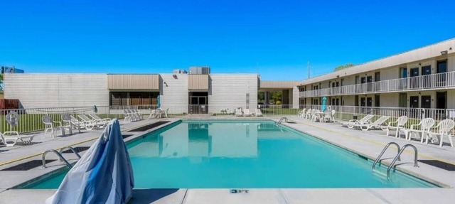 Experience Relaxation with Pool and Free On-Site Parking | 4 Affordable Rooms