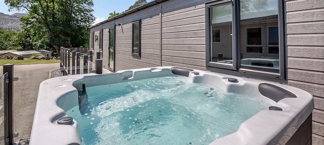 Experience ultimate luxury with the brand-new Faraday lodge with hot tub.
