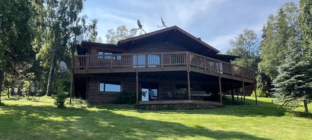 Explore Alaska while staying at this beautiful 4 bedroom house on Island Lake!