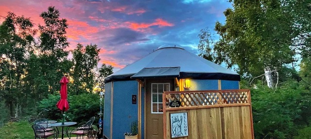 Fanciful mountainside yurt with private bathhouse