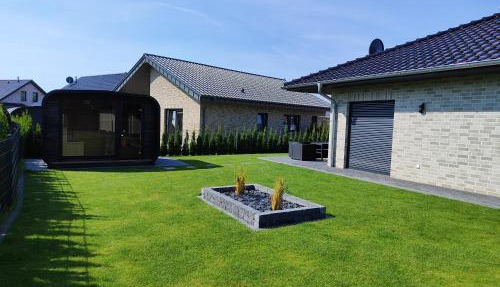 Ferienhaus Devilina mit Sauna und Kamin am Harkebrügger See