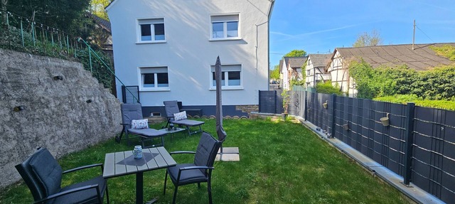 Fewo Elya – Garden Paradise Near Events, Outlet, and Spa