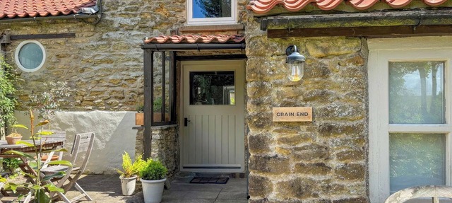 Grain End Cottage is set in large landscaped gardens.