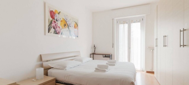 GuestHost - A comfortable and bright 57 square meters apartment, perfect for four people, located on the first floor of a building with an elevator (NOT accessible to disabled guests).The property is located halfway between Lambrate and Udine, a quiet ar