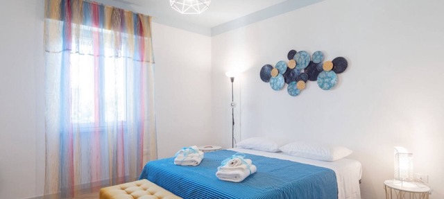 GuestHost - Domus Perrone Garden Blue