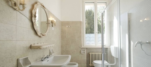 GuestHost - Stunning villa divided over three levels (ground, first and second), WITHOUT lift. There are internal stairs to access the upper floors.In 410 square meters of space it comfortably accommodates 12 people.Detached villa with a private garden s