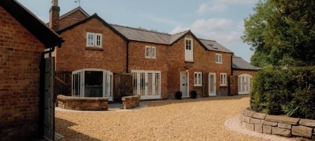 Historic building offers an inviting retreat with its charming blend of comfort and elegance.
