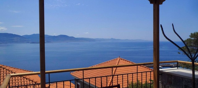 Ideally located in the village center, near the sea with breathtaking views