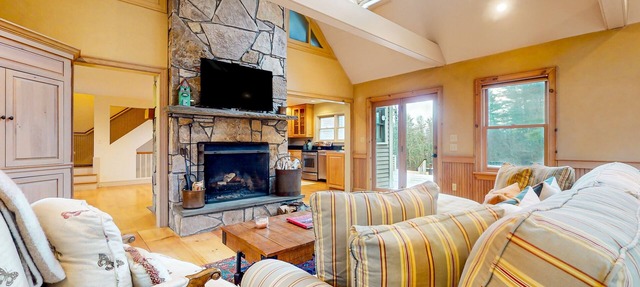 Ideally located spacious home with pool table, large deck, five fireplaces, W/D