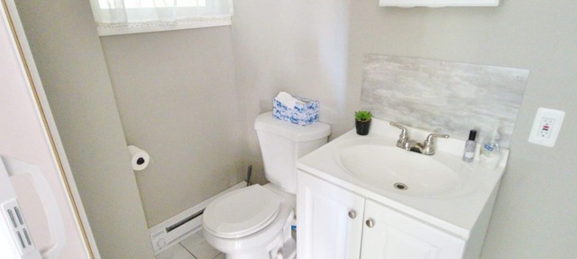 In unit laundry. AC, Modern Studio with desk and parking