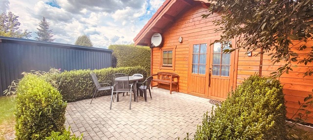 Kleines gemütliches Ferienhaus im Blockhausstil by Interhome
