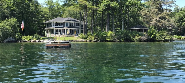 Lakefront 6-bedroom, 3.5 bath house with 2 docks & sandy swim area in Wolfeboro