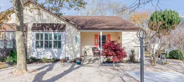 Lovingly renovated Village Green Quad within walking distance to the harbor.