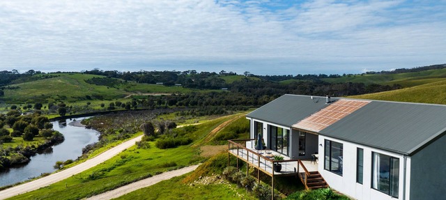 Luxe off-grid beach house with panoramic views of Middle River & Snelling Beach