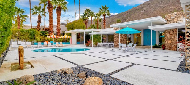 Mid-century modern estate with a pool, hot tub, gourmet kitchen, and fireplace