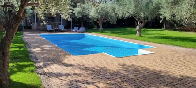 Minimal house with pool and large garden at Varkiza. 5 minutes from the beach!