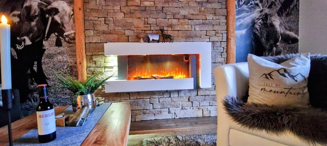 Modern 2-room apartment in Allgäu style with alpine panorama in a central location.