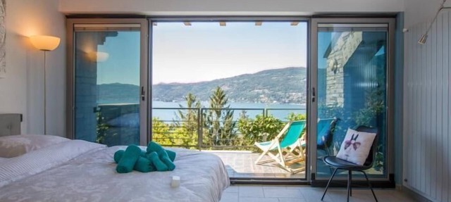 Modern 4½-room terraced corner house with sauna, garden and gigantic lake view