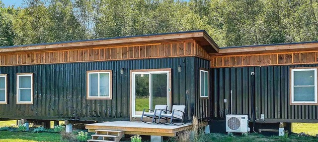 Modern Container House with mountains, river, and privacy.