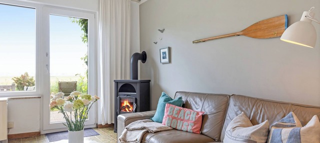On the wildly romantic natural beach, enchanting view, cozy with stove, sauna