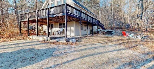 Open concept home close to the beach with gas fireplace and deck