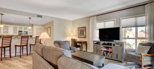 OVER-SIZED 2 BR PATIO UNIT STEPS TO POOL & COURTYARD!