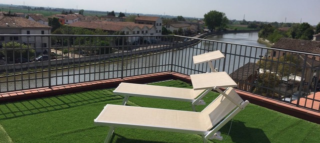 Palazzo Spada - App. Flamingo penthouse with terrace overlooking the Po River