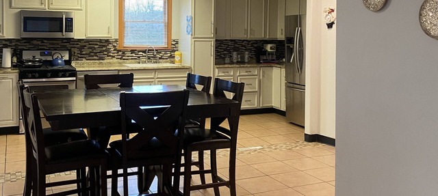 Peaceful home in Monroeville with easy accessibility and a huge yard