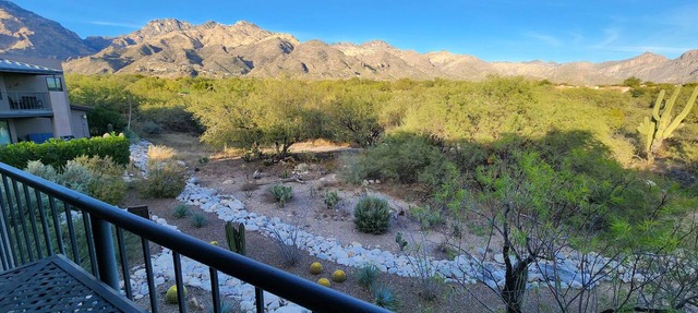 Private patio has spectacular golf -mountain views and many interior upgrades