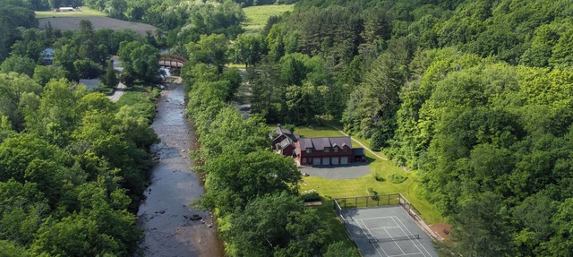 Private river-front home with tennis court and hot tub in the Berkshire hills!