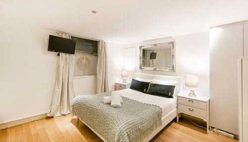 Private rooms with shared bathrooms and a top floor studio