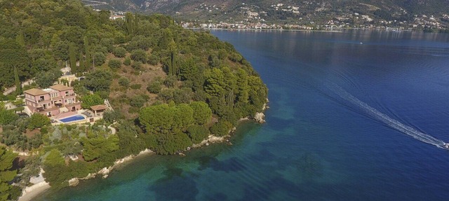 Private waterfront villa with pool and two private beaches