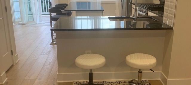 Relax in an upscale modern new town house. 10 minutes from Dulles Int'l Airport.